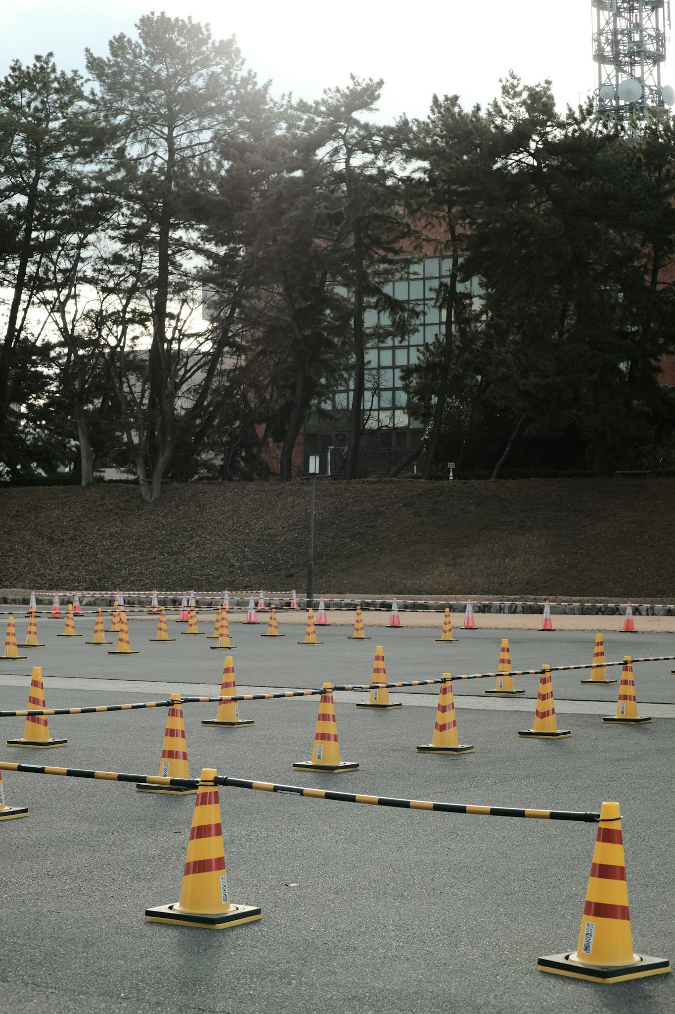 Outdoor driving course with traffic cones setup for training and practice.